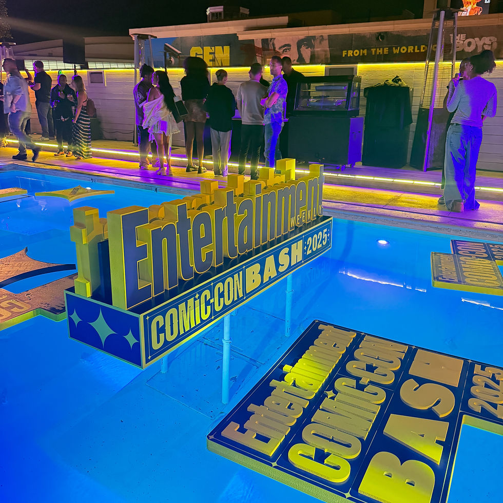 Entertainment, Comecon Bash 2025 sign, standing on poles above a pool