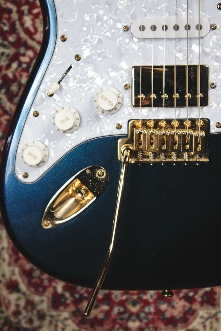 Thumbnail: Close up of Gordon Smith Classic S HSH pickup configuration and gold tremolo hardware