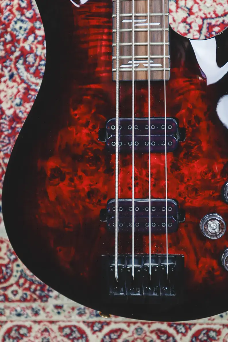 Thumbnail: Schecter Omen Elite-4 bass figured top, dual pickups and bridge