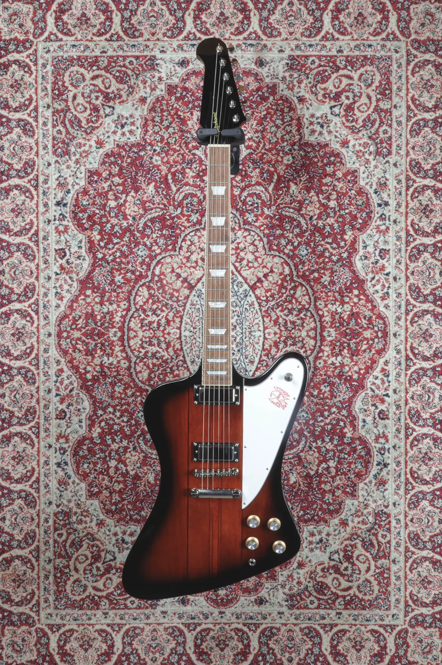 Front view of 2022 Epiphone Firebird in Vintage Sunburst