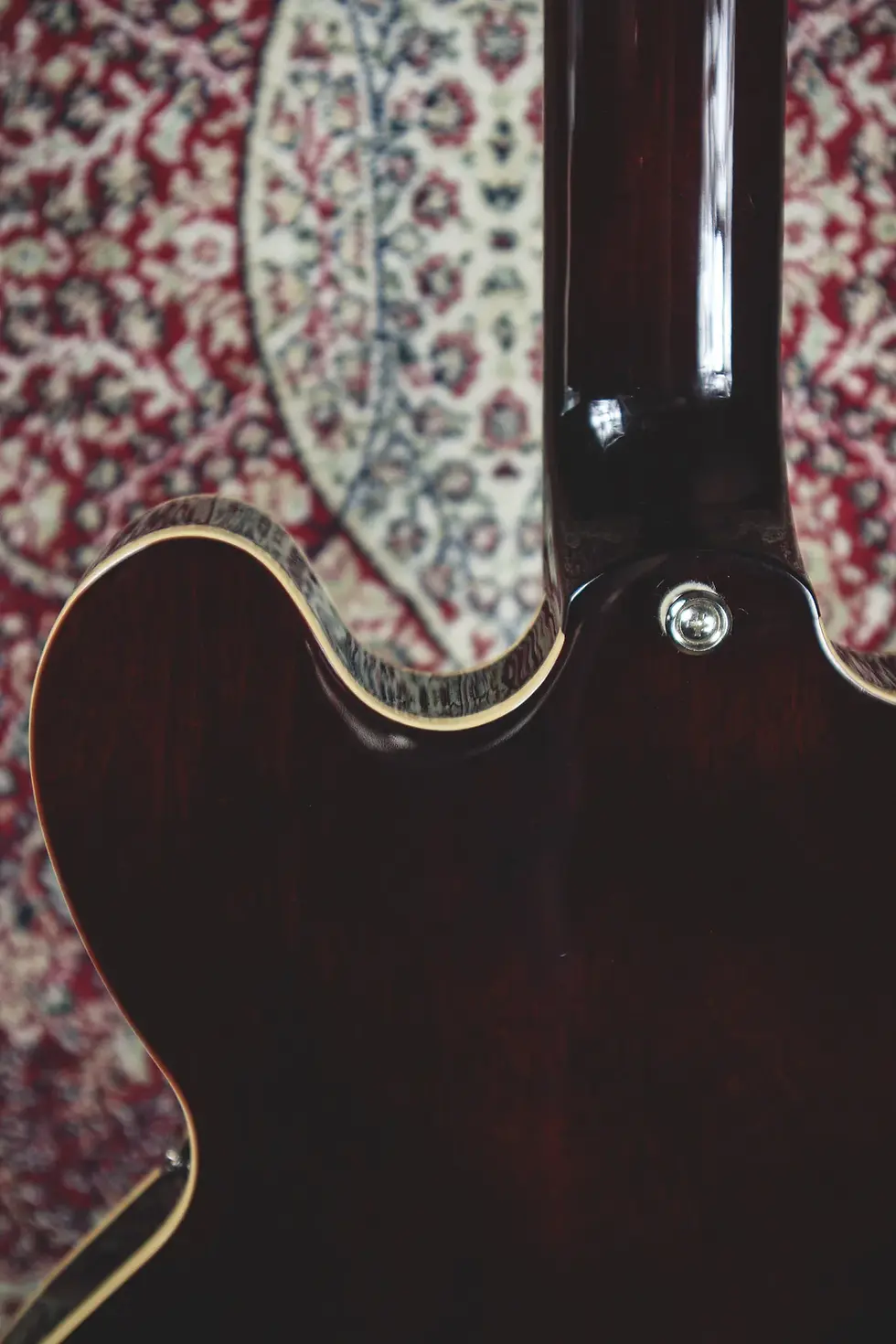 Thumbnail: Neck joint and binding detail on back of Epiphone Noel Gallagher Riviera
