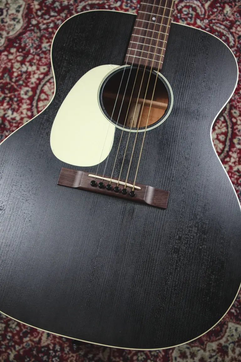 Thumbnail: Martin 000-17E Black Smoke left-handed acoustic guitar body close-up