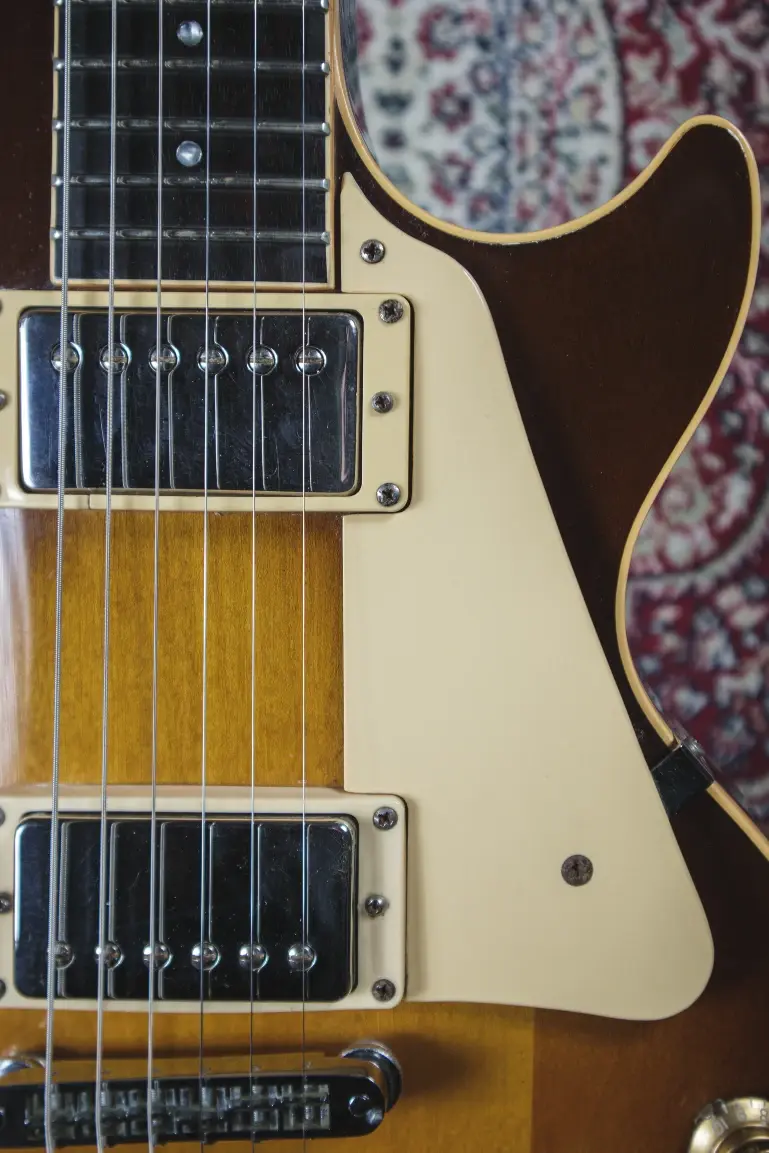 Thumbnail: Front body close up showing pickups and pickguard on Gibson Les Paul Studio Standard 1986