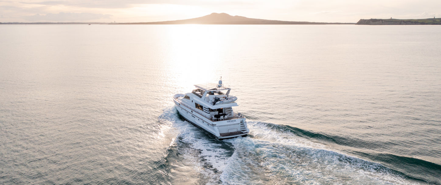 Far Shot Of Yacht In Water