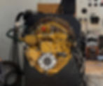 Yellow industrial engine on test stand