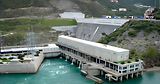 Hydroelectric dam with water flowing from powerhouse