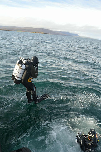 Diver jumping into Scapa Flow