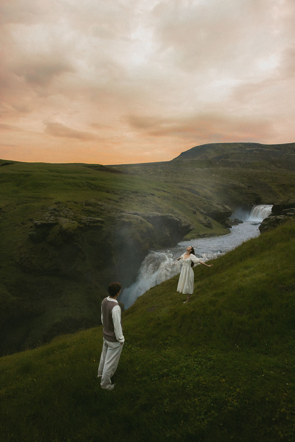 Madison & Gabriel cinematic waterfall couple session in Iceland