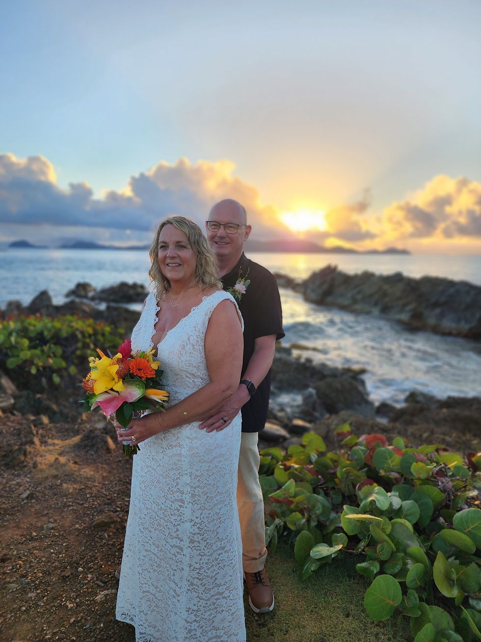 Sunrise wedding with Island Mike at Prettyklip Point at Sapphire Beach