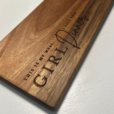 Charcuterie board engraved with "This is my dinner. I call this Girl Dinner"