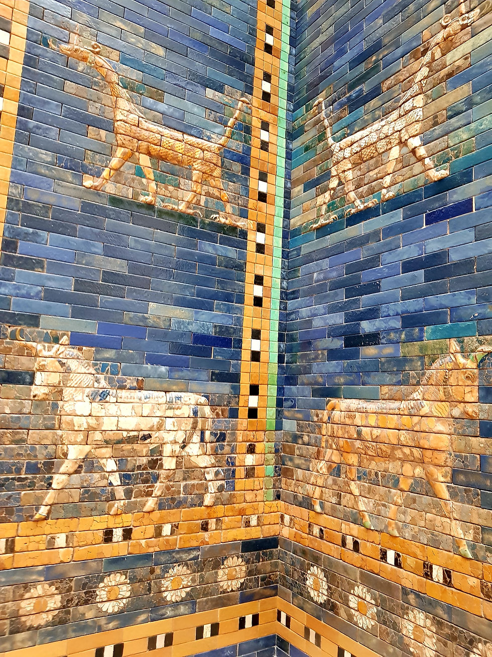 The ancient tiles of the wall depict ancient depictions of animals.