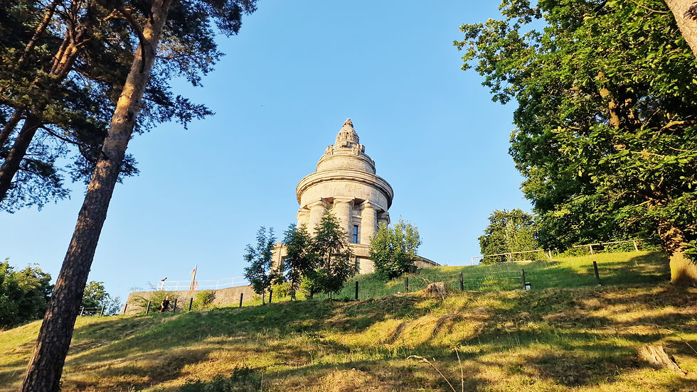 The round, walk-in monument sits enthroned on a hill.