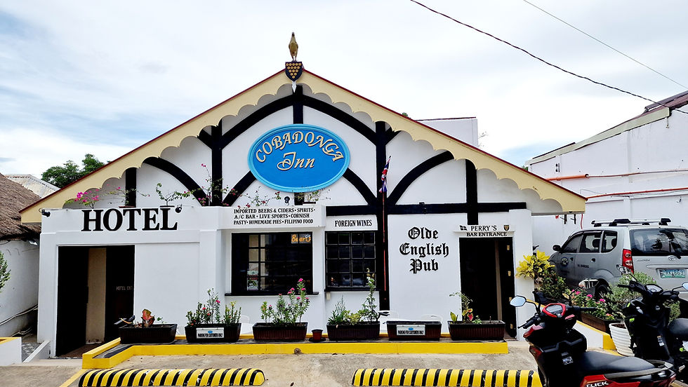 In the village, a white half-timbered hotel houses an Old English pub.