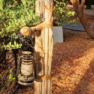 Oil lamps are hung throughout the grounds and discreetly illuminate the way to the room at night.