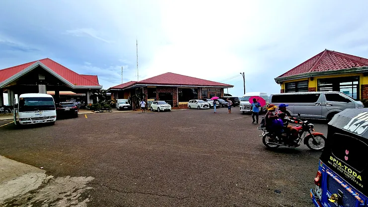 Parking lot and service building on the tourist site of the Chocolate Hills.