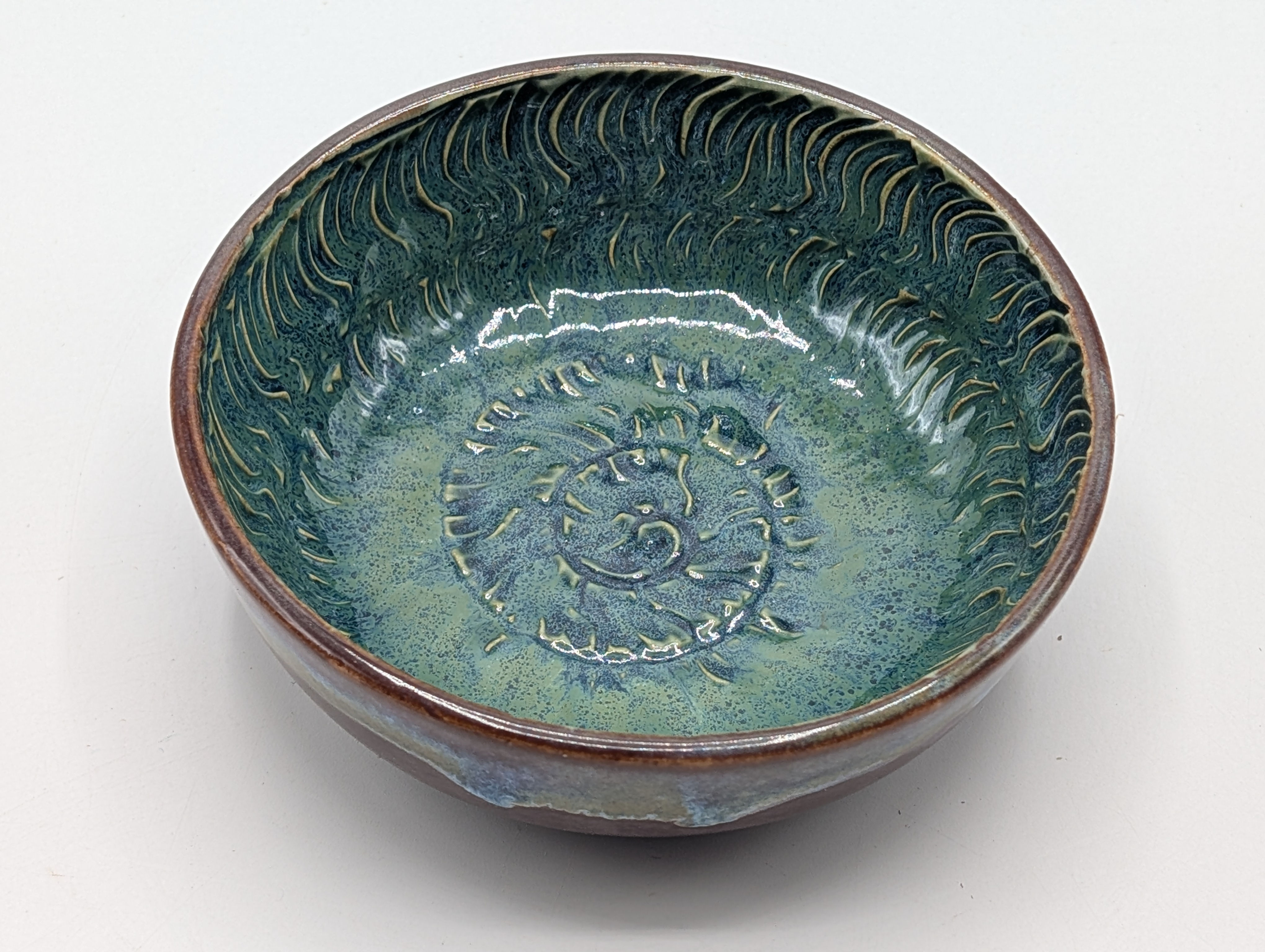Hand Thrown and Carved teal ammonite pattern Bowl