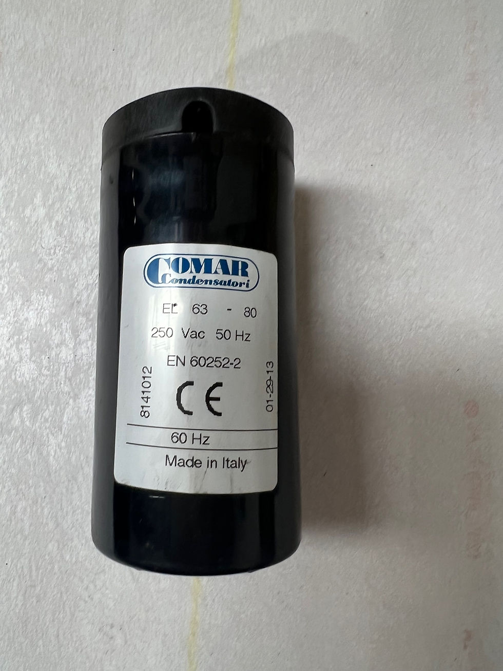 Electric motor start capacitor