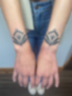 symmetrical flowers tattoo