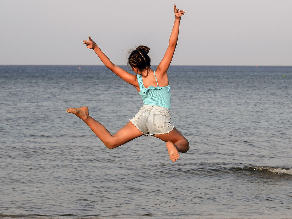Teen jumping happy