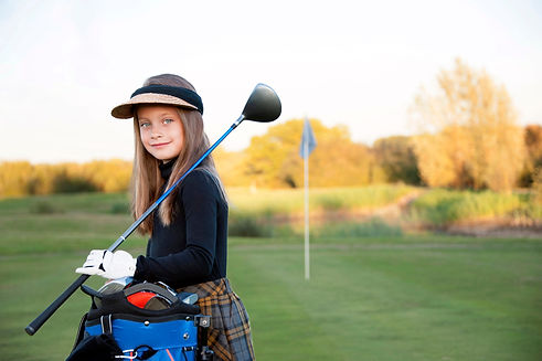 A Happy Young Girl at the Golf Course .jpg