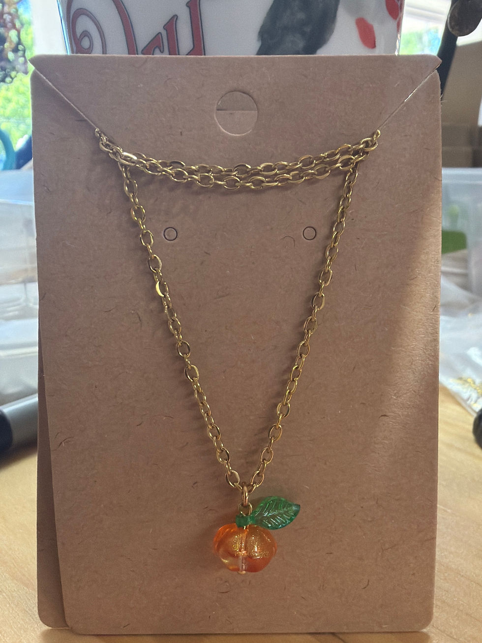 Thumbnail: Glass Pumpkin necklace 