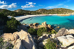 Costa Smeralda Sardinia secluded beach and turquoise water — luxury yacht charter Mediterranean.