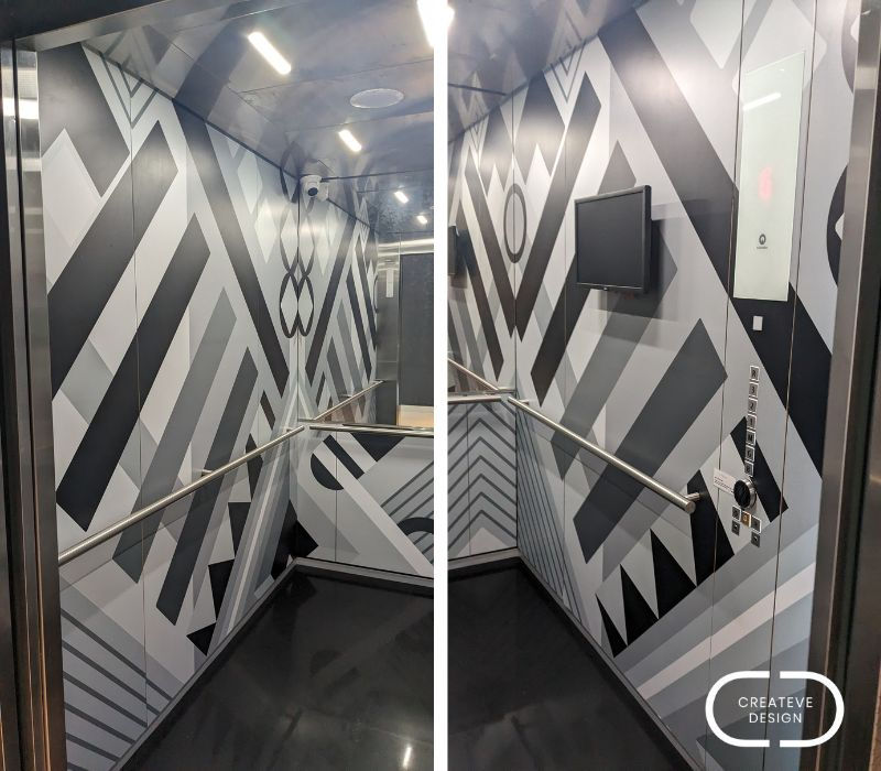 Al Khozama Hotels and Residences KAUST branded elvator design in plack, white and grey, complimenting their existing artwork and design throughout the hotel created by CreatEVE Design