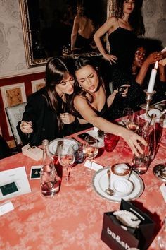 Girls taking a selfie while enjoying Dinner with Strangers