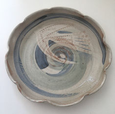 Blue and green slip decorated serving plate. Bird motif and scalloped edges. Shallow bowl, ideal as table centre-piece