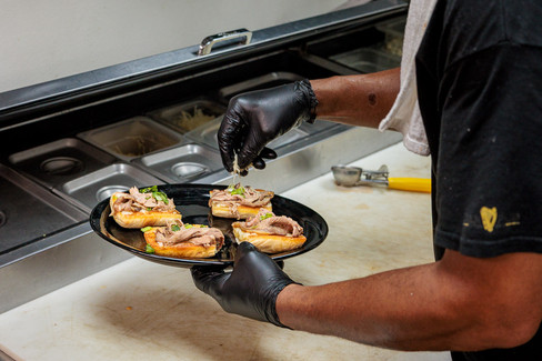 Kitchen staff plating food at Dublin Pub Dayton Ohio