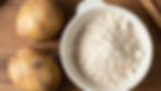 Potatoes and dehydrated potato powder in bowl