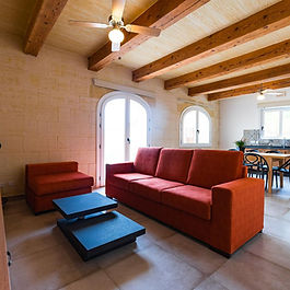 💶 €1,800 monthly – price possibly negotiable
📍 Nadur REF: 26-015
Set within one of Gozo’s most desirable villages, this beautifully restored and generously proportioned three-storey house offers a rare blend of authentic Gozitan character and refined contemporary living. A home of real presence, scale, and versatility — ideal for families, professionals, or those seeking a quality long-term residence.
Upon entry, you are welcomed by a grand entrance hall, immediately setting the tone with traditional stonework, graceful arches, and a sense of space rarely found in rental properties. The ground floor seamlessly transitions into a well-designed, open-plan kitchen, dining, and living area, finished with exposed timber beams, high-quality cabinetry, and ample space for both everyday living and entertaining.
The property opens onto a private pool and sun deck, offering a tranquil outdoor retreat — perfect for relaxed afternoons or evening gatherings in complete privacy.
Accommodation is spread comfortably across the upper floors and comprises four well-proportioned bedrooms, two of which enjoy en-suite facilities. One room is particularly flexible and can easily be adapted as a home office, studio, or playroom, making the layout highly adaptable to modern lifestyles. In total, the house benefits from four bathrooms, complemented by a guest toilet on the ground floor.
A further highlight is the roof terrace, providing additional outdoor space with open village views — ideal for entertaining, quiet mornings, or simply enjoying Gozo’s year-round climate.
Throughout the property, finishes are tasteful and timeless, with excellent natural light, generous room sizes, and a calm, understated elegance that is both practical and inviting.
Key features include:
• Three full storeys
• Large, welcoming entrance hall
• Open-plan kitchen/dining/living
• Private swimming pool & deck
• Four bedrooms (one easily adaptable)
• Four bathrooms (two en-suite)
• Guest toilet at ground floor
• Roof terrace with open views
• Character features combined with modern comfort
📌 Ref: 26-015
📲 Contact Anthony Reed on WhatsApp: 79268080
A rare opportunity to secure a high-quality home in Nadur. Early viewing is strongly recommended.