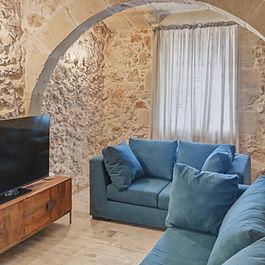 Experience refined island living in this distinguished three-bedroom farmhouse, gracefully positioned on the tranquil outskirts of Nadur, Gozo. Meticulously restored to preserve its authentic Gozitan character, the residence showcases original limestone walls, exposed timber beams, and artisanal tilework, creating an ambiance of timeless elegance. Sunlit interiors flow seamlessly from a bespoke, fully equipped kitchen—complete with premium appliances and a dishwasher—to spacious living areas curated for both relaxation and sophisticated entertaining. Each bedroom is a serene retreat, enhanced by air conditioning for year-round comfort. Step outside to a private pool oasis, framed by lush Mediterranean gardens and mature stonework, offering an idyllic setting for alfresco gatherings or quiet reflection. With airspace ownership, family-friendly amenities, and proximity to village life, transport links, and Gozo’s renowned beaches, this fully furnished home presents a rare opportunity to embrace the authentic charm and contemporary luxury of Malta’s most coveted countryside.
