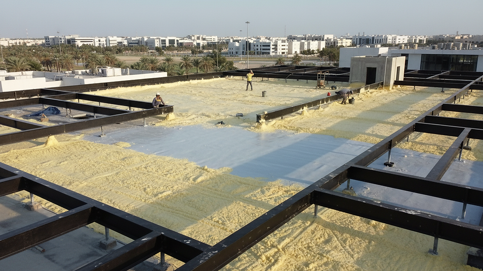 High angle view of a roof with freshly applied PU foam insulation and protective coating