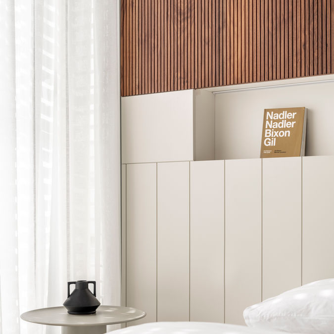 Modern bedroom interior design: minimalist decor, wooden wall accents.