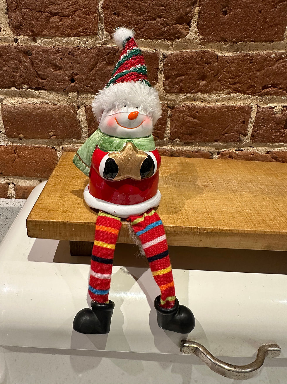 Shelf sitting snowman Santa