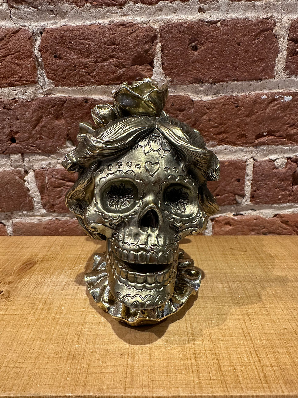 female gold skull
