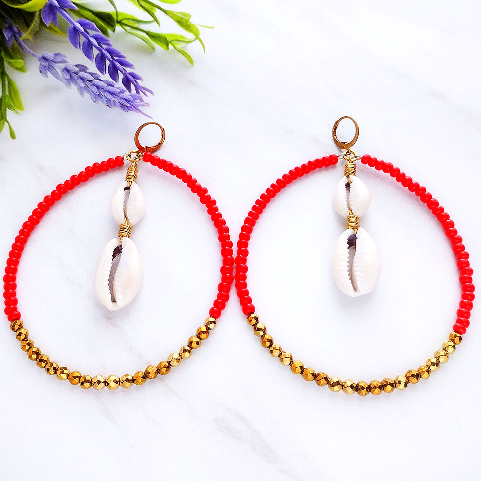 Thumbnail: Handmade beaded hoop earrings in red accented with gold hematite beads and shells