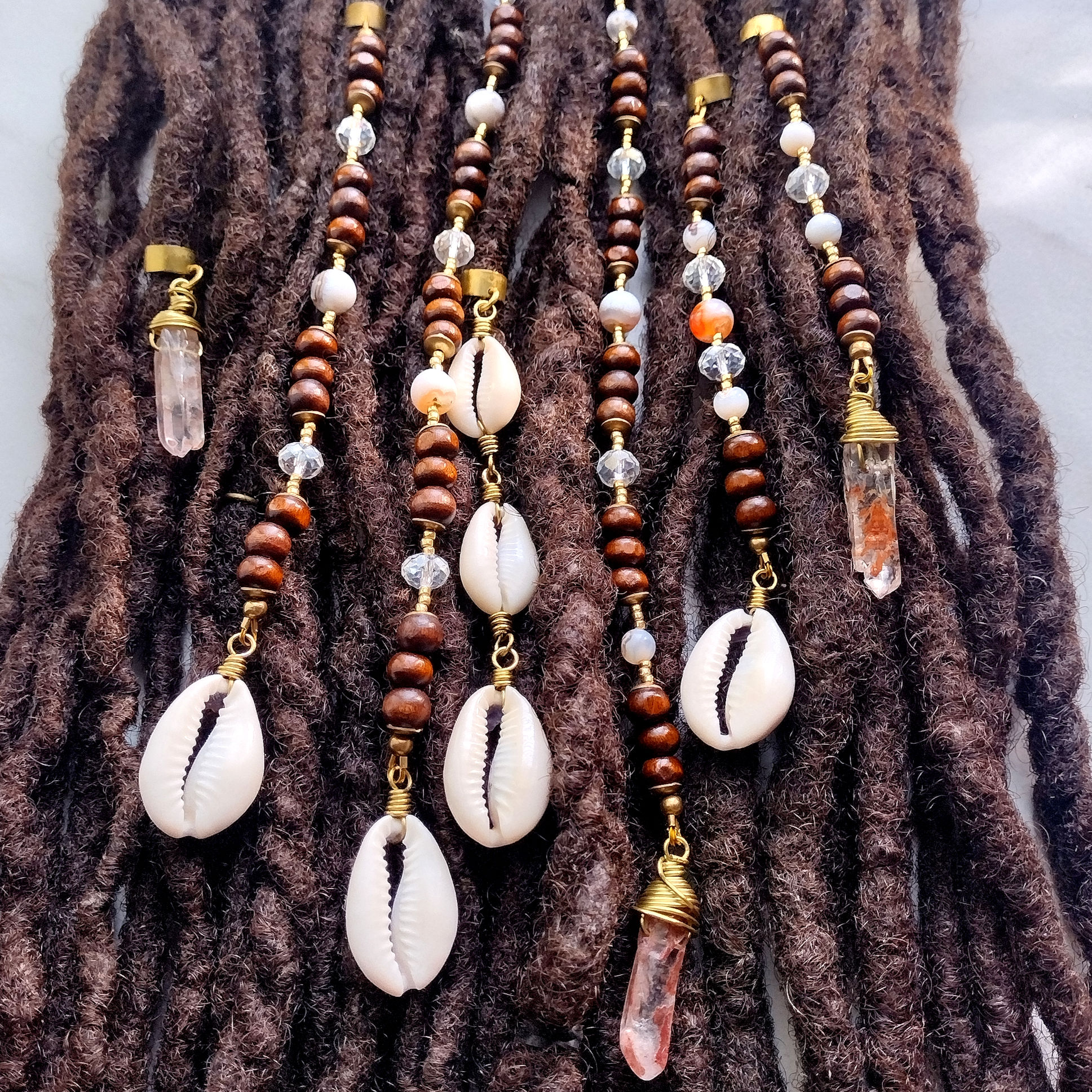 Mama Ocean long loc bead set with wood beads, cowrie shells, quartz, agate, and brass accents