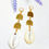 Thumbnail: Large Cowrie Shell & Brass Earrings