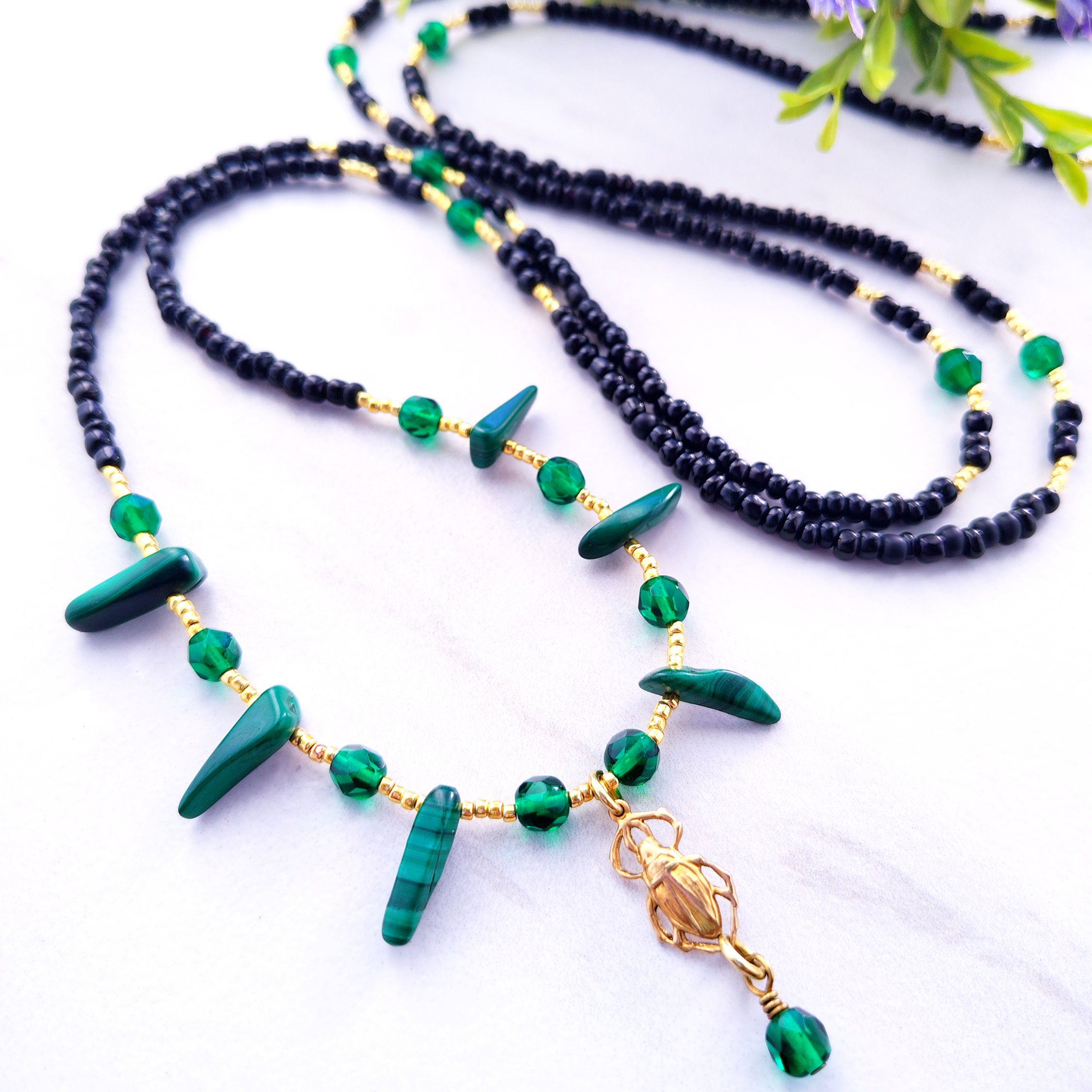 Divine Return malachite waist beads with green stone beads and gold details