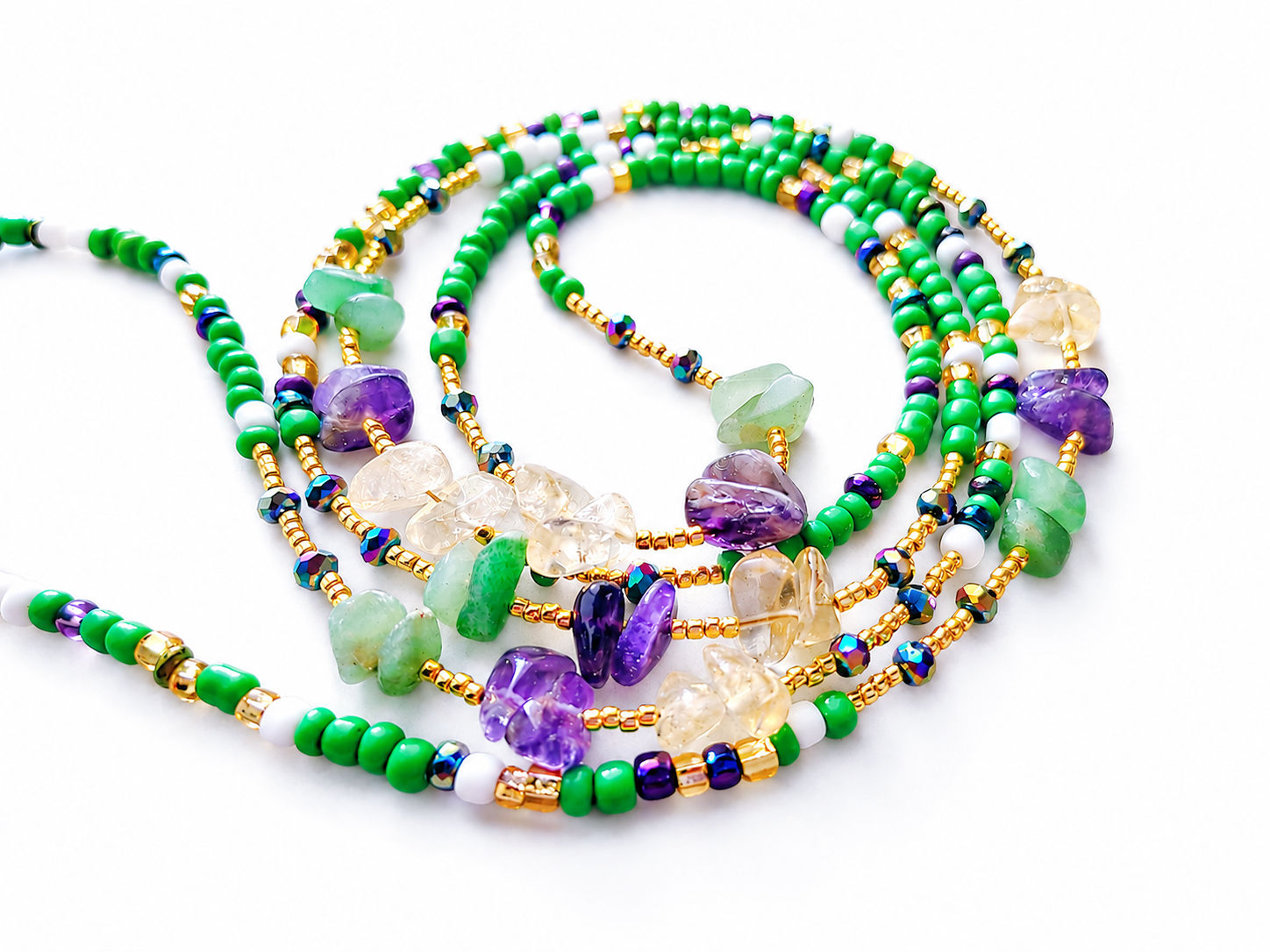 Green and white waist beads with amethyst, citrine, and aventurine stones and gold bead accents