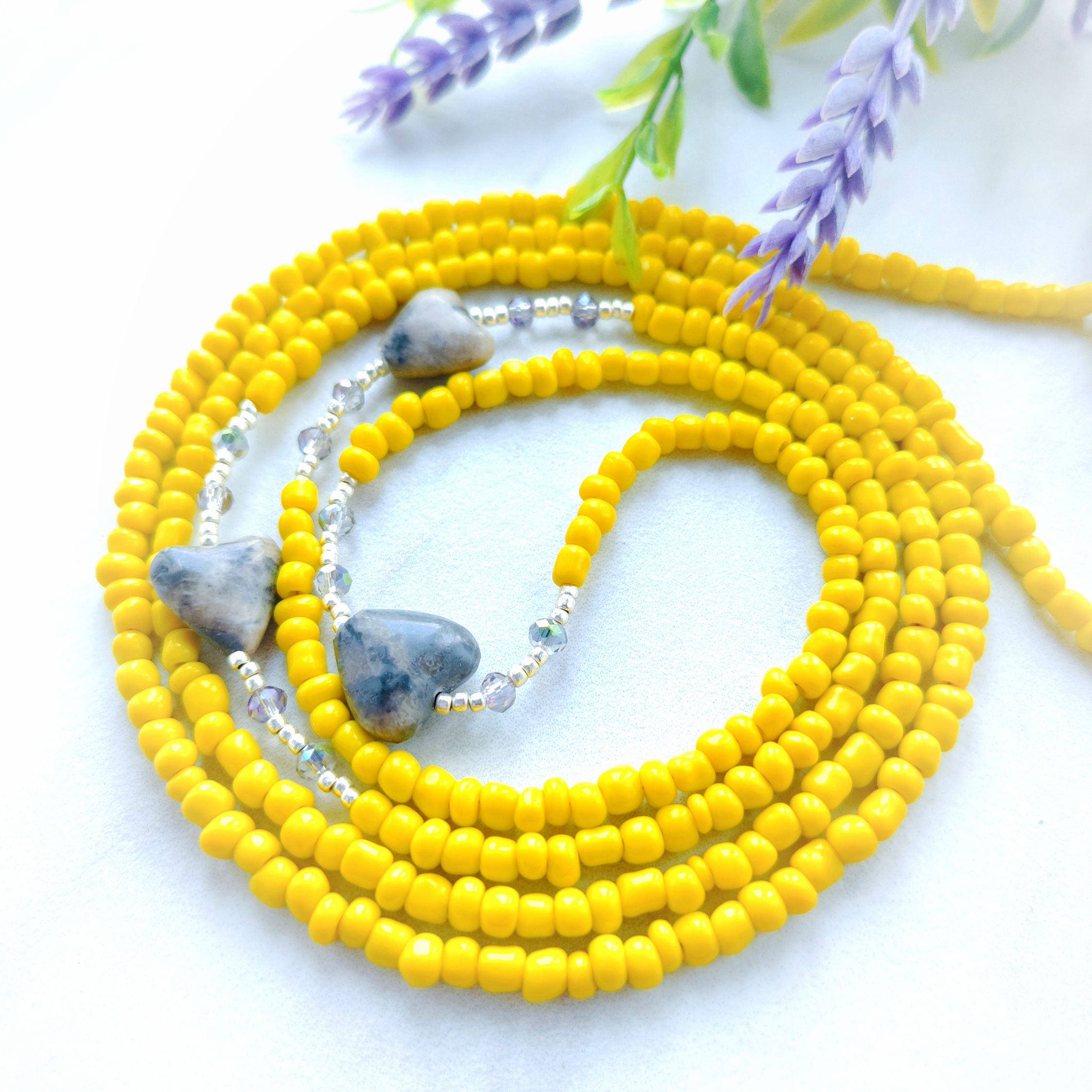 Yellow waist beads featuring Picasso jasper heart stone and silver bead accents