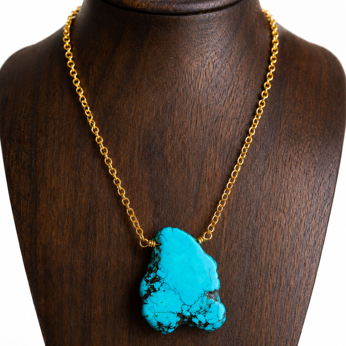 Turquoise Howlite Slice Brass Chain Necklace with a natural turquoise howlite pendant.