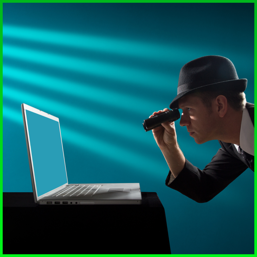 Man spying on a laptop 