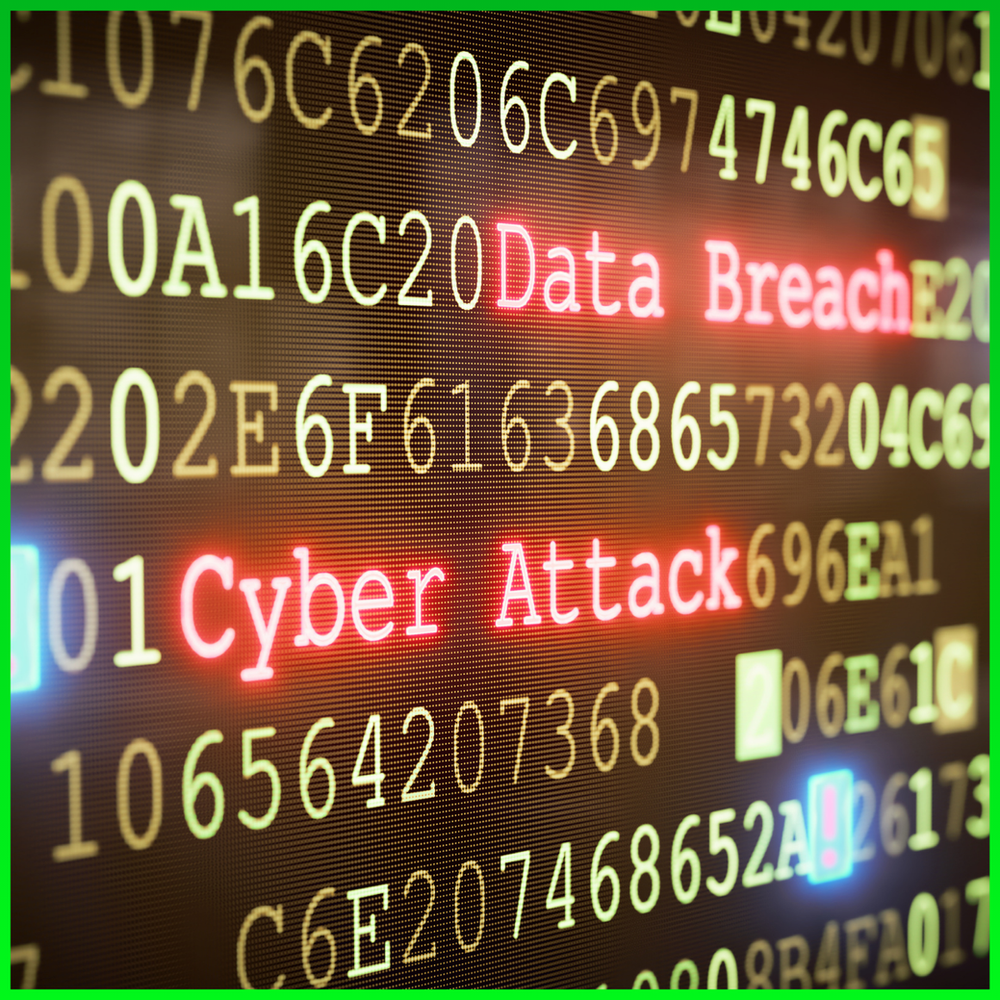 Digital screen showing the words "Data Breach" and "Cyber Attack"
