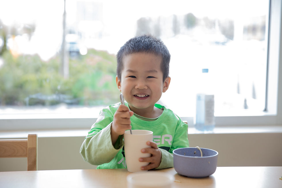 Casa student smiling with a nutritious meal