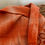 Thumbnail: Handwoven Lambswool Scarf - Burnt Orange Circles