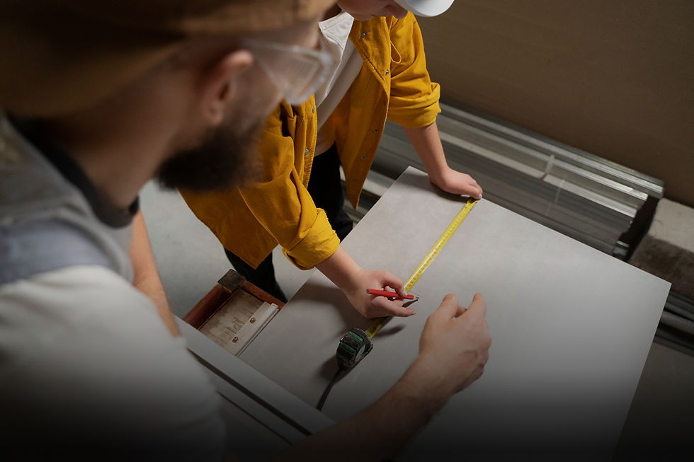 Two people measure tile with tape measure, construction, and Real Estate