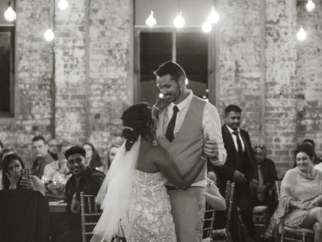 A couple dancing on their wedding day at the bond Shed